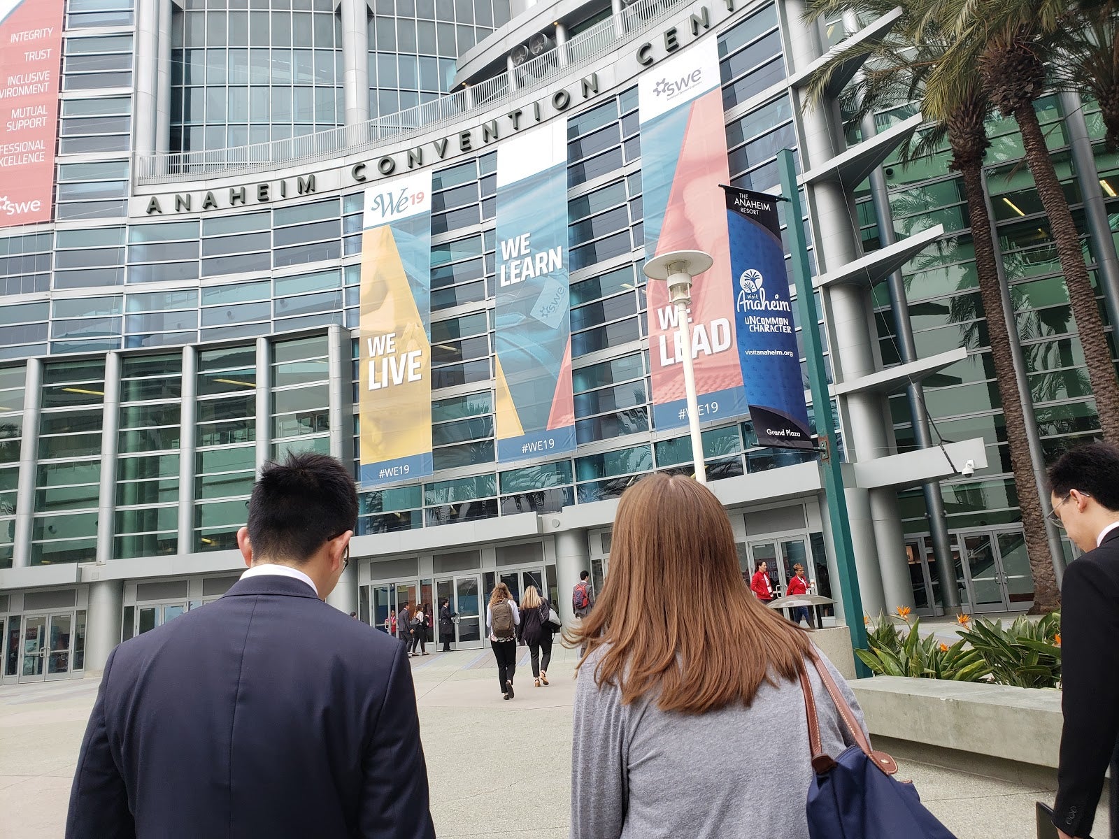 Erik Wu and Ellie Reynolds standing in front of the Anaheim Convention Center.