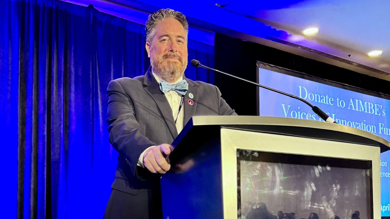 Michael King speaks at the AIMBE conference