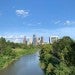 A view of the downtown Houston skyline with Buffalo Bayou in the foreground.