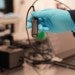 PrecisionView tool held by a green-gloved hand