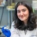 PhD student works in a lab